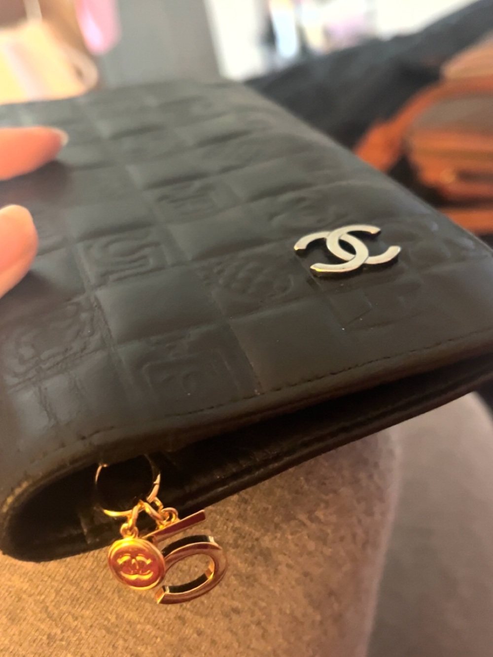 CHANEL Black Quilted CC Charm Zip Wallet with Gold Accents